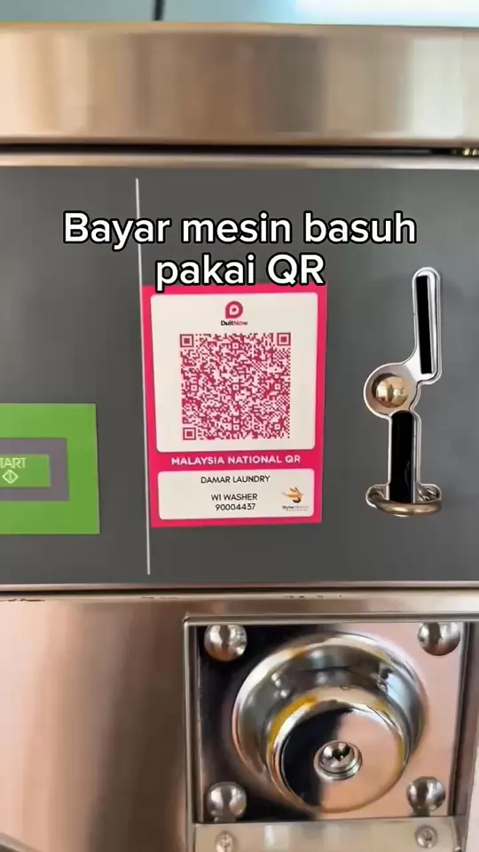Frame from Byte Bunny's own washer film: a DuitNow QR code on a self-service washer